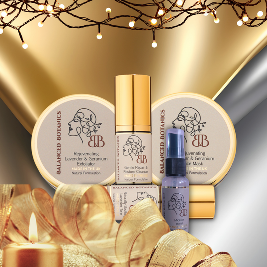 Balanced Botanics skincare products with decorative elements on a gold and gray background