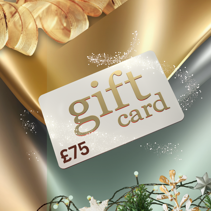 Gift card with £75 value on a decorative background with gold ribbon and festive elements.